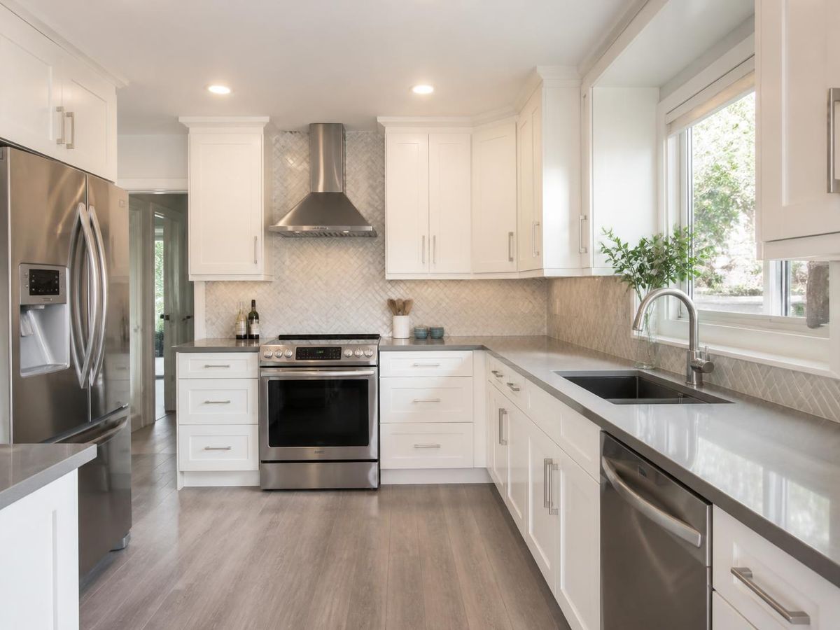 Renovated kitchen with new cabinets and countertops